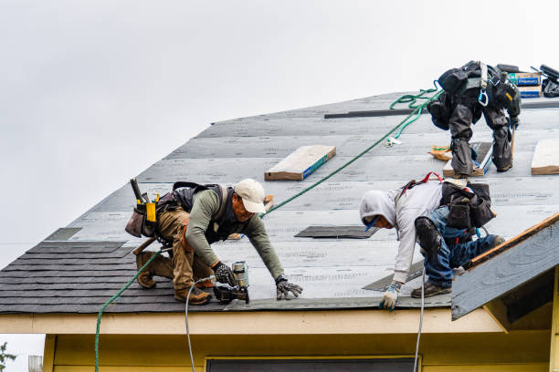 Professional Flat Roof Repair technician working in Carnegie, OK